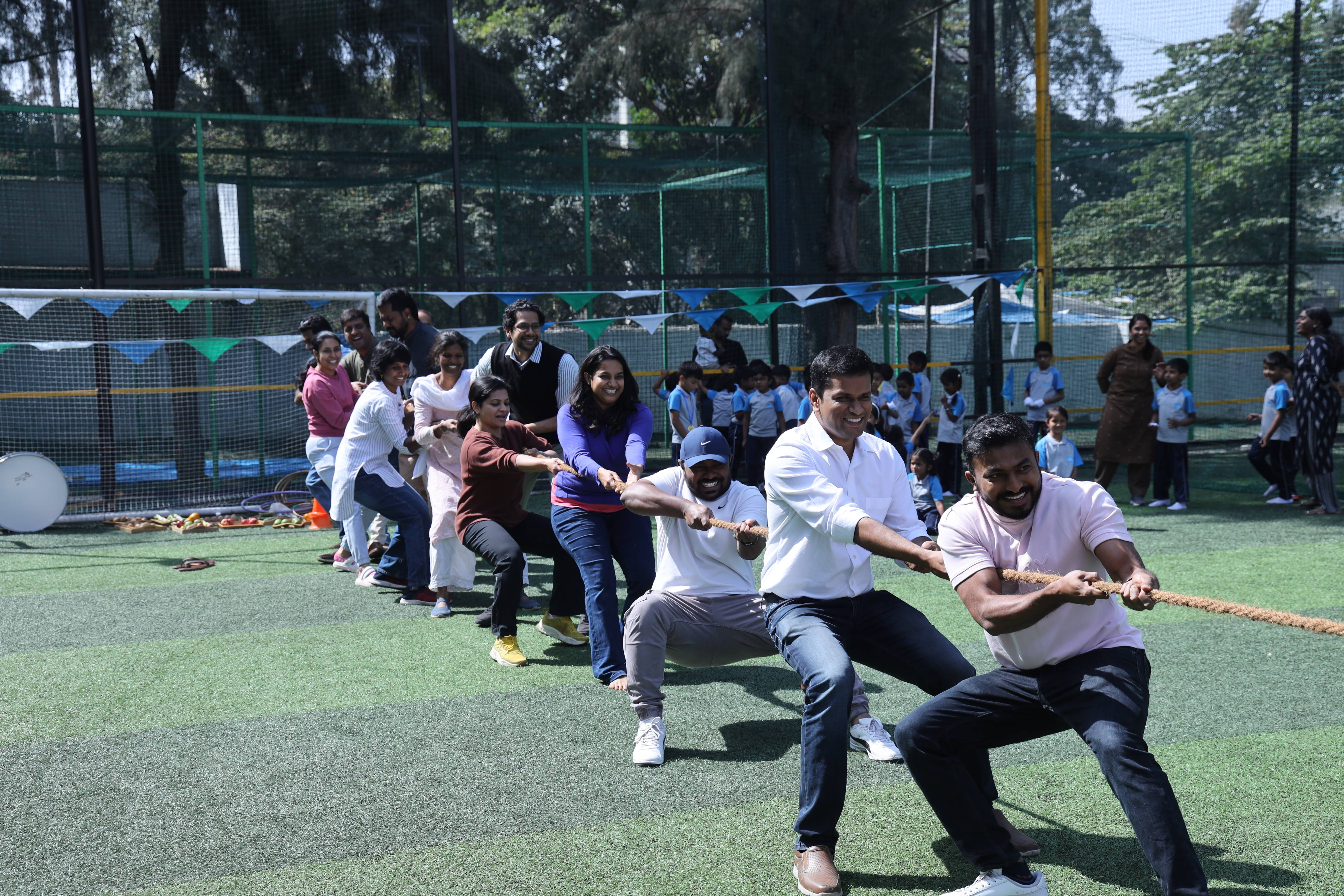 parents doing tug of war